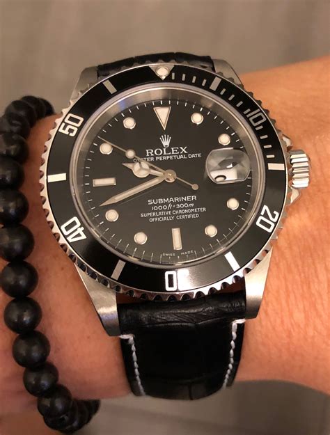 rolex leather strap submariner|Rolex 114060 on leather strap.